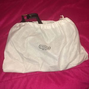 Black coach purse. Yes it’s real